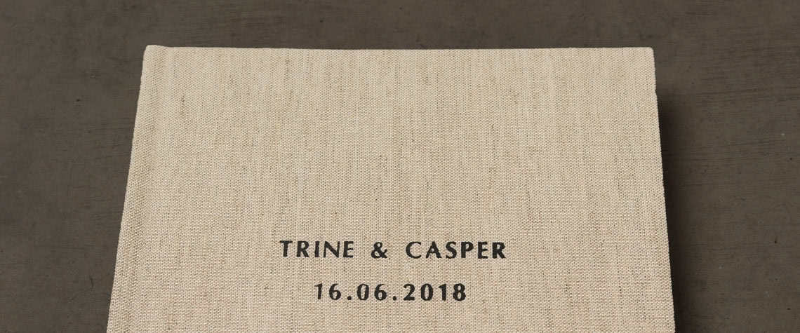 Fotoalbum med omslag i stof